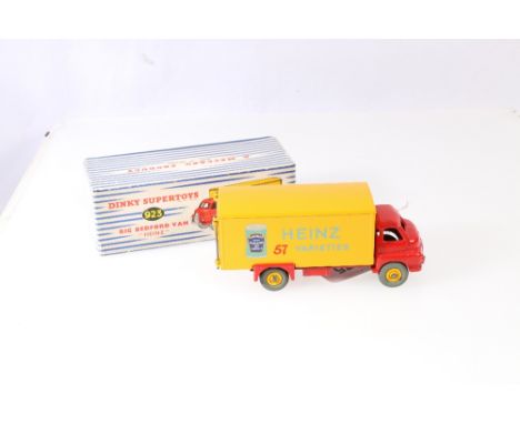 Dinky Supertoys 923 Big Bedford van Heinz Baked Beans variety with red cab, yellow body and grooved hubs, in striped pictoria