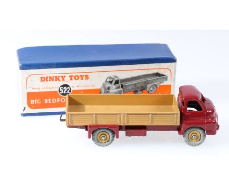 Dinky Toys 522 Big Bedford lorry with maroon cab, brown/fawn body and hubs, in blue box with pictorial label.