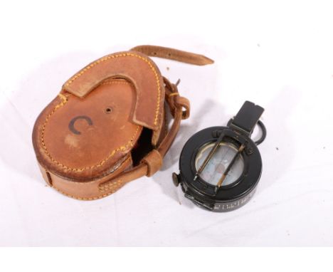 Military issue sighting compass dated 1943 mkIII number 209841 with mother of pearl dial in leather case.