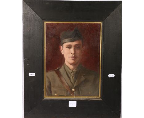 M D NISBET Portrait of a young officer Signed and dated 1917, oil, 30 x 22cm