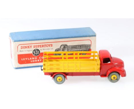 Dinky Toys 531 Leyland Comet lorry with body, with red cab and chassis, yellow back and hubs, in blue box with pictorial labe