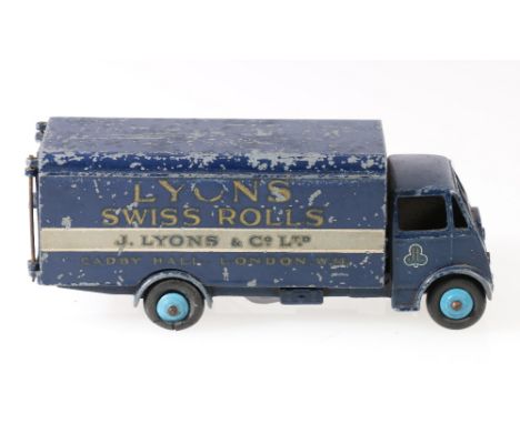 Dinky Toys 514 Guy van Lyons, 1st type cab with dark blue body, mid blue ridged hubs, cast axle mounts, no box.