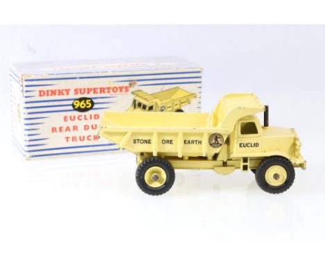Dinky Supertoys 965 Euclid rear dump truck with  pale yellow body and hubs, in striped pictorial box.
