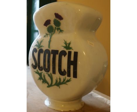 Scotch Motor spirit petrol pump globe lamp by Hailware. CONDITION REPORT: NIbbled around the sock foot.  NO obvious chips or 