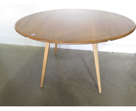 An Ercol blonde elm drop leaf dining table - 72cm x 113cm  - 123cm extended Condition report:  In clean condition 