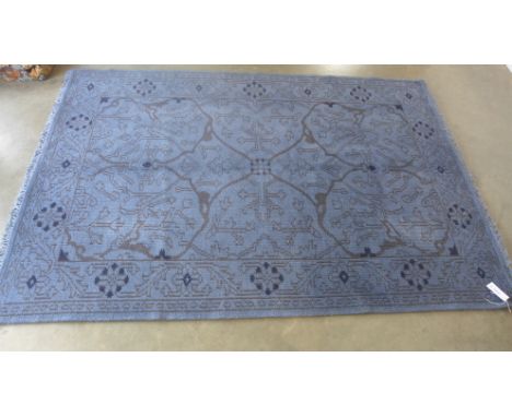 A blue ground handmade Agra carpet  - 2.30m x 1.60m