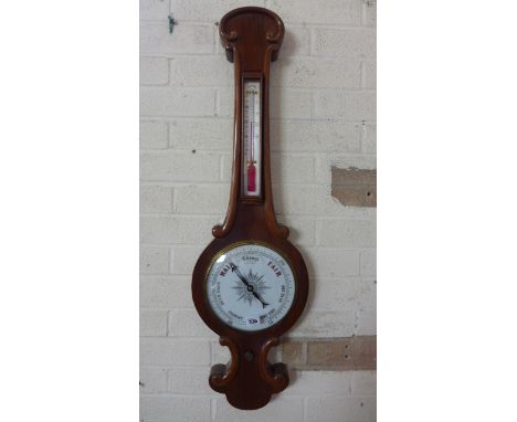 A 19th century mahogany case barometer and thermometer Condition report: Working 