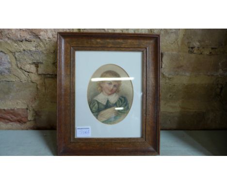 A framed and glazed pencil portrait of a child - 22cm x 27cm - unsigned
