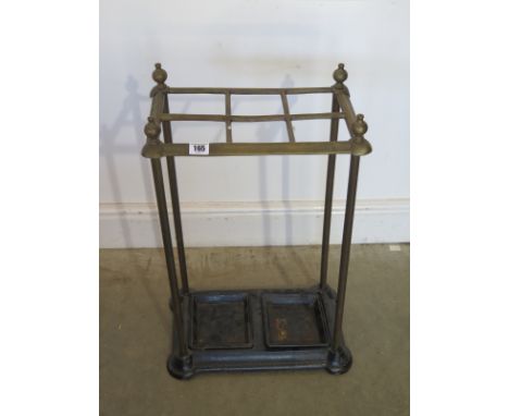 An Edwardian brass and iron six section umbrella/stick stand - Height 67cm x 37cm x 22cm - chip to base, otherwise generally 