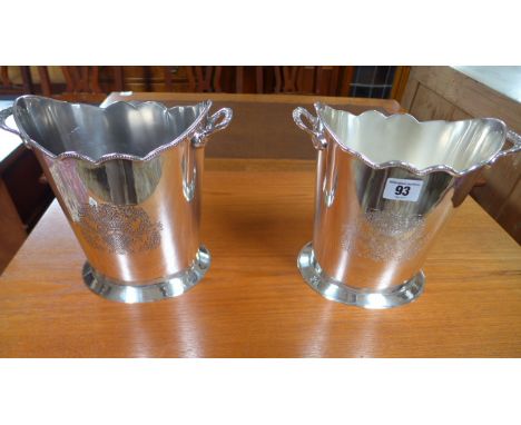 A pair of silver plated wine cooler - Height 22cm 