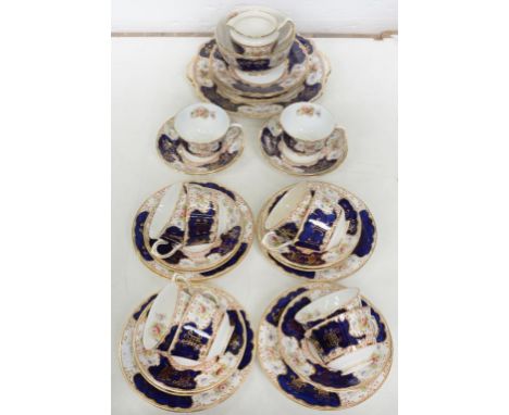 A COBALT GROUND BONE CHINA FLORAL TEA SERVICE, GILT PRINTED MARK LAURIE AND CO..., C1900