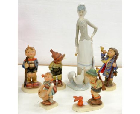 A LLADRO FIGURE OF A GOOSE GIRL, 27.5CM H, PRINTED MARK AND FIVE W. GOEBEL FIGURES OF CHILDREN, MODELLED BY M. J HUMMEL