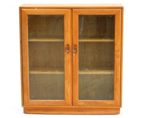 AN ERCOL WINDSOR TWO DOOR CABINET, 98 X 91CM