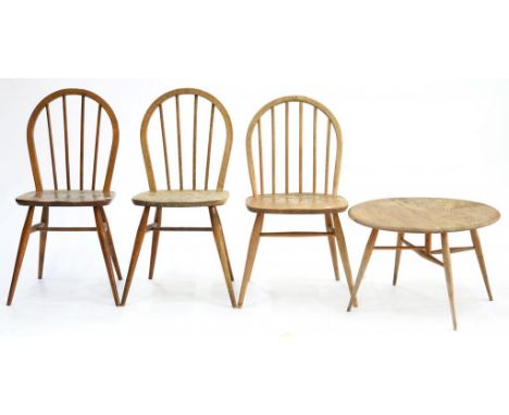 AN ERCOL PEBBLE STYLE FOLDING COFFEE TABLE AND THREE ERCOL DINING CHAIRS