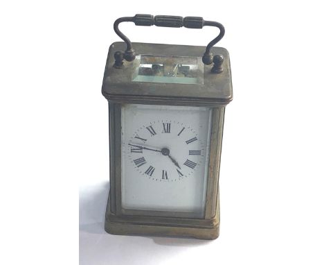 Vintage brass carriage clock in working order but no warranty given 
