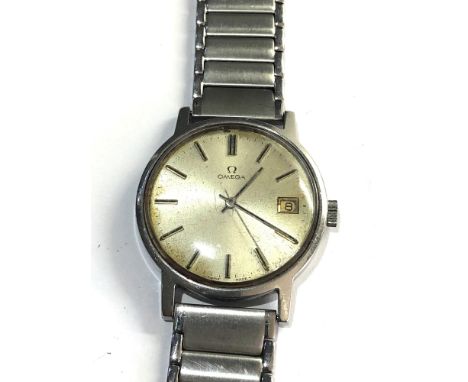 Vintage gents omega wristwatch it is in working order but no warranty given please see images for details 