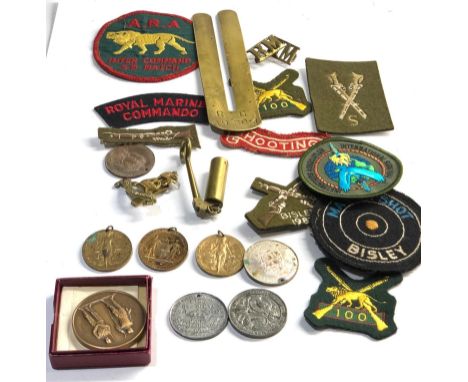 Selection of military / shooting item includes badges patches medals etc please see images for details 