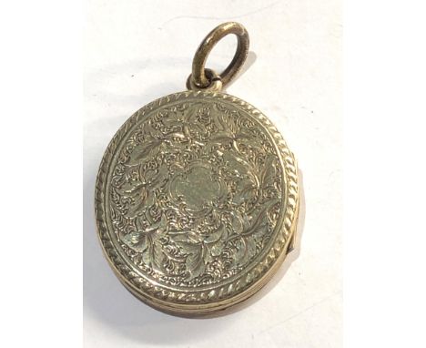 Antique Gold and enamel back and front locket measures approx 34mm by 26mm please see images for details 