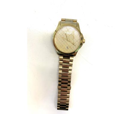 Vintage gents Gucci wristwatch the watch is ticking but no warranty given,&nbsp;We have not taken the back of this is possibl