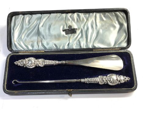 Large silver handled button hook and shoe horn in original fitted box please see images for details 