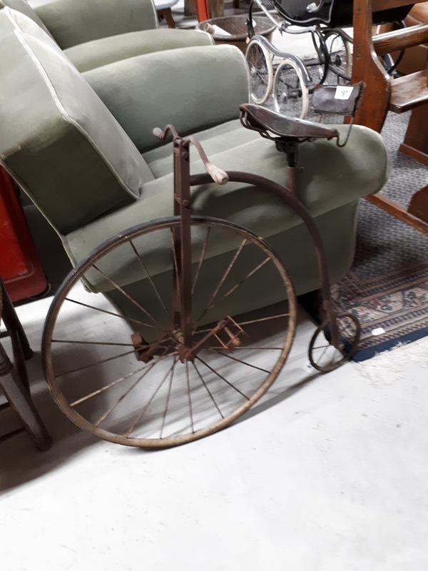 Unusual child's penny farthing bicycle.