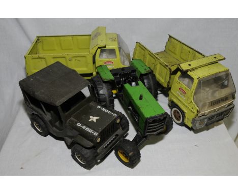 Two Tonka hydraulic dumper trucks, Tonka Army Jeep and a Tonka tractor