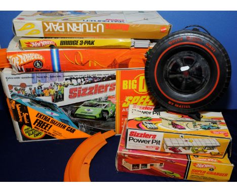 Selection of Hot Wheels in original boxes including Sizzlers Power Pit, Super Charger, Power Boost, Bridge 3 Pack, U Turn Pac