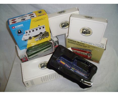 Three Atlas Editions collectable trams in original boxes, Tower tram 1.76 plastic kit of a metropolitan tram car, Corgi Class