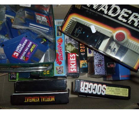 Galaxy Invader LSI Game, selection of computer games Omega including the Sensible World of Soccer, Mortal Combat, John Madden
