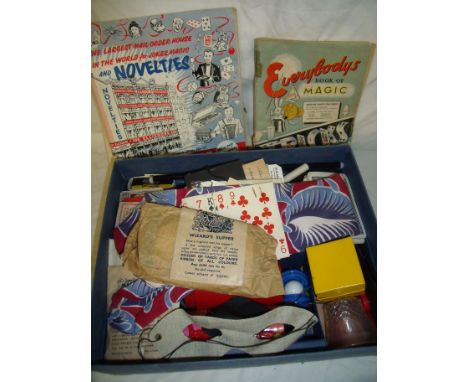 Box of assorted magicians tricks, the Kaymar Magic Series Instruction Folder, Indian Yogi, Everybody's Book of Magic etc in a