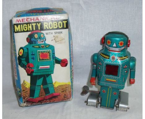 Mechanical  tin pate Mighty Robot with spark in original box 
