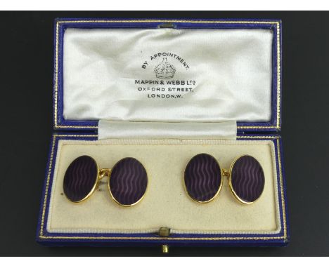 A fine pair of 9ct gold and aubergine enamel cufflinks. Birmingham 2005. 15.5 grams. 19mm in length. UK Postage £10. 