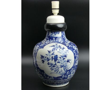 Chinese blue and white porcelain vase, which has been converted to a table lamp. 43 cm high. 21 cm in diameter. UK Postage £3