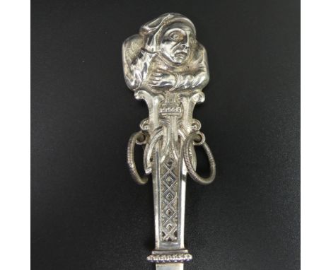 An unusual Norwegian Trondheim silver fork with a Folklore character finial. 46 grams. UK Postage £12. 