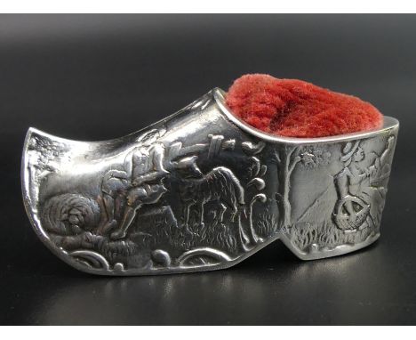 A Dutch silver clog novelty pin cushion. 52 mm long. UK Postage £10. 