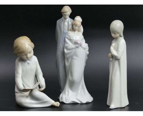 Three Lladro Nao porcelain figures viz. a boy reading, a Bride and Groom and one holding a candle. Tallest 22 cm. UK Postage 