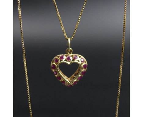 9 carat gold sapphire and ruby 'Night and Day' pendant and 46 cm box link chain. 2.8 grams. Pendant 20 mm x 15 mm. UK Postage