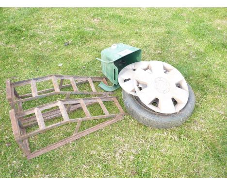 Pair vehicle ramps, gate hanging feeder, two hub caps and five stud 117\70 - R13 spare wheel and tyre.