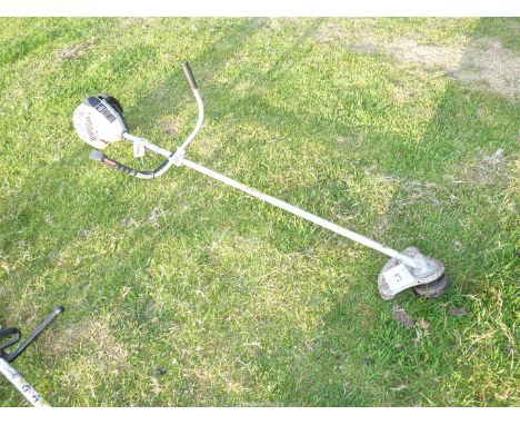 Spear and Jackson strimmer with bump-feed, [good compression ], (owner says is in good working order).