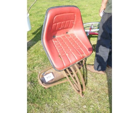 A Lawn Mower Seat/Roller.