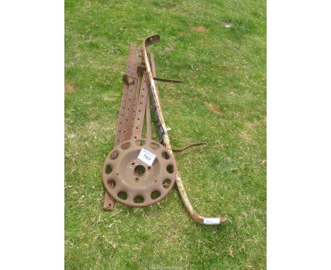 Large sash clamps, old steel bumper, part of an old Vintage wheel centre.