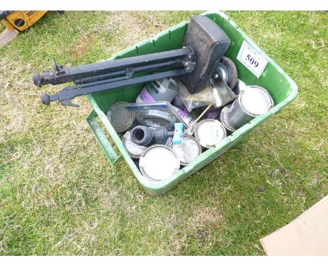 Box of paint, tripod stand, pipe fitting and castor wheel.