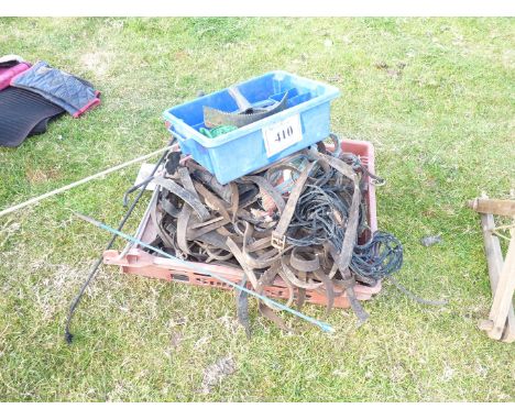 A quantity of horse tack including leathers, whip, etc.,