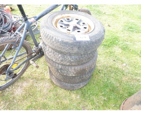 Four Wheels and tyres, 155-SR-13 and a mountain bike (8 speed derailler gears).