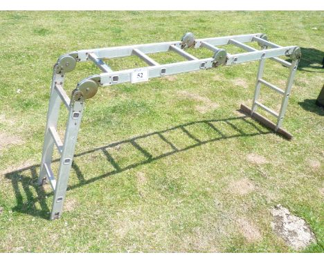 An aluminium folding ladder.