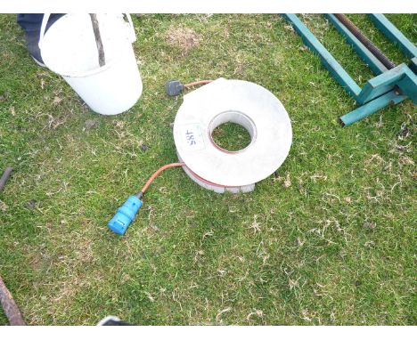 240 volt extension reel with blue coupling.