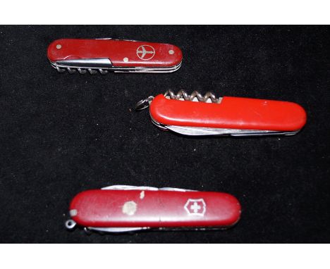 3 Victorinox Swiss army knives