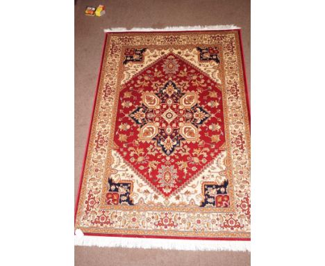 Red ground Heriz carpet, size 2.30 x 1.60