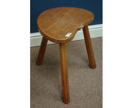 'Mouseman' oak three legged stool, dished seat, by Robert Thompson of Kilburn, H45cm   Condition Report   Click here for furt