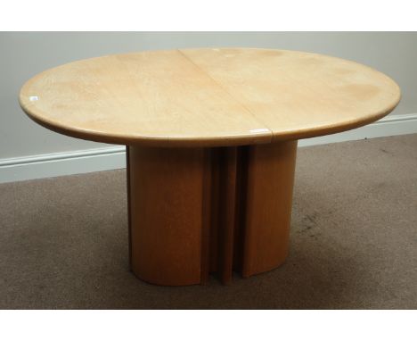 Skovby of Denmark - circular light oak extending dining table on oval pedestal, with patent sprung foldout leaf (100cm x 135c